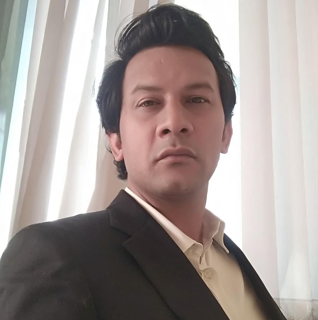 Dr.MANISH JHA